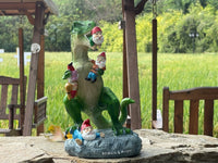 T-REX EATING GARDEN GNOMES MASSACRE - BY MARK & MARGOT